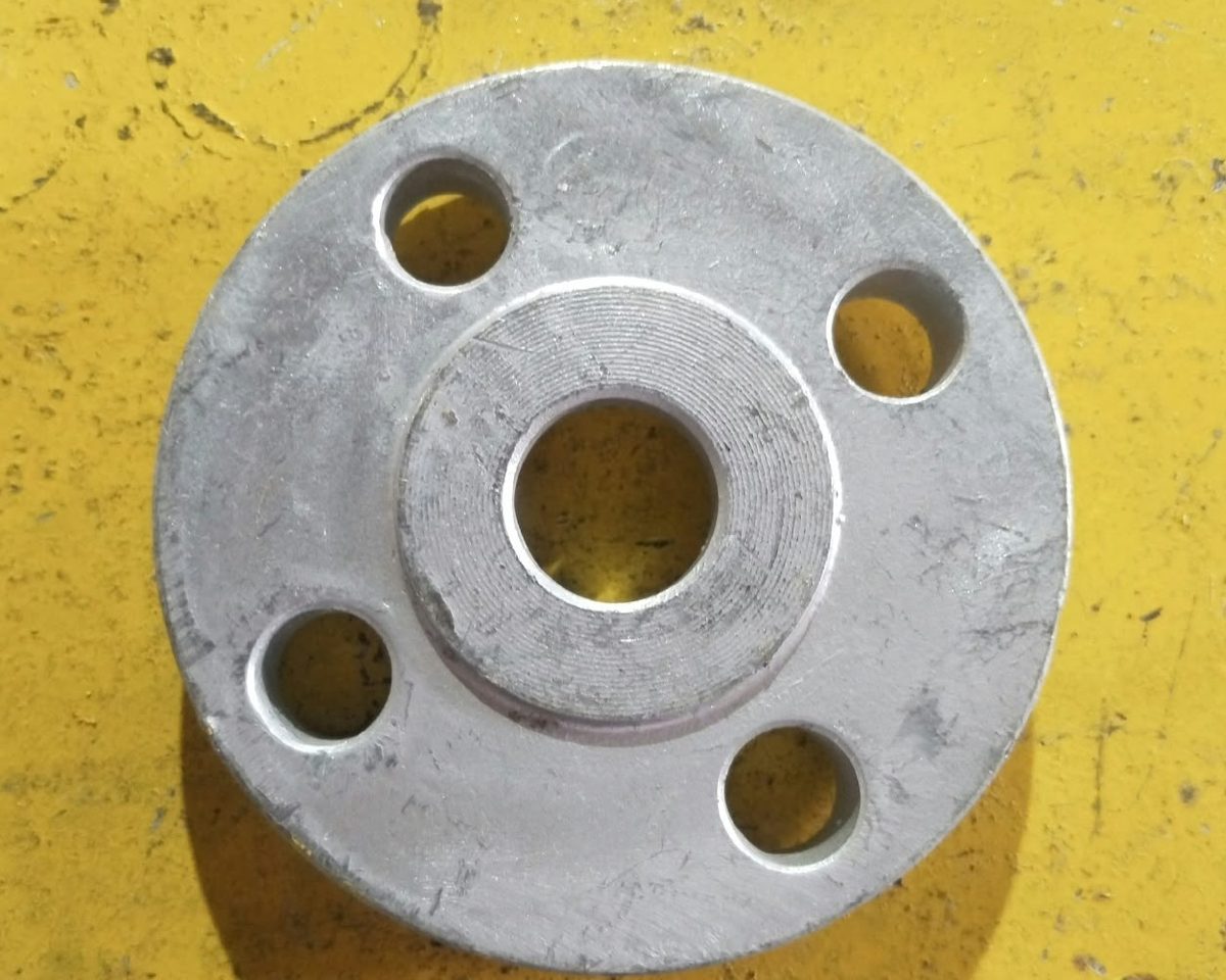 Raised face flange with the standard serrated gasket face finish