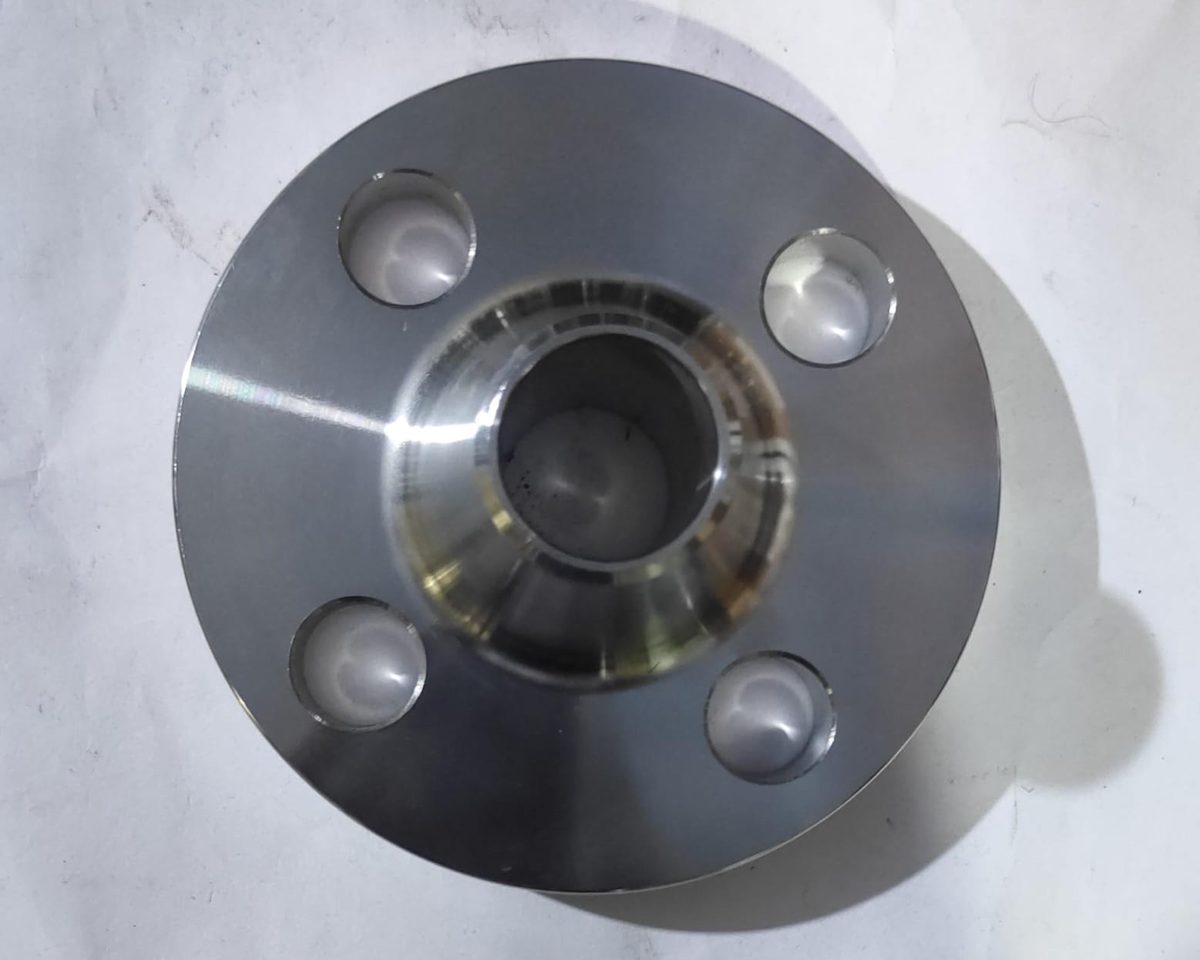 Machined weld neck flange seen from the hub end, showing the tapered hub